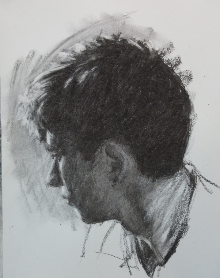Charcoal portrait of a boy looking away – Demonstration
