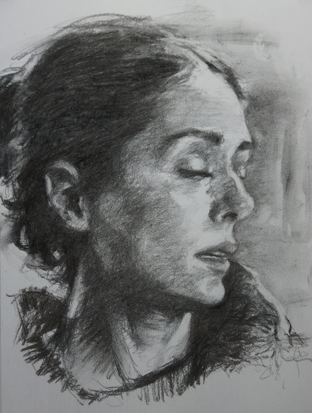 Charcoal drawing of a woman looking down – Demonstration